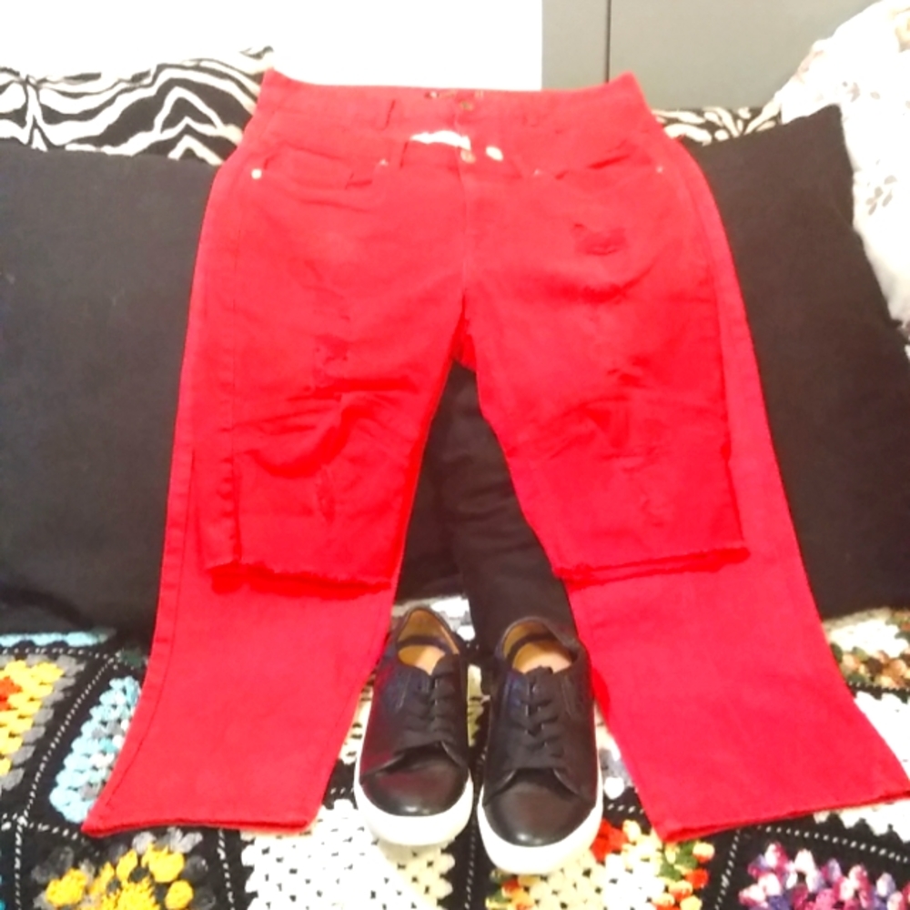 Red Jean's, red ripped jean shorts and black Jaxson slide on shoes